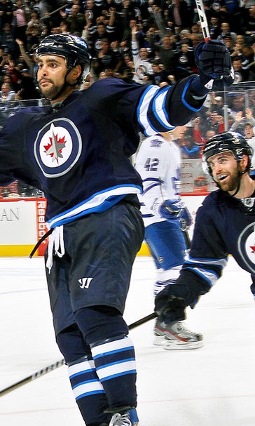 Byfuglien's overtime tally lifts Jets past Maple Leafs